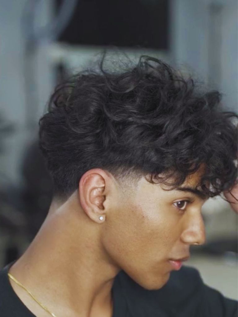 Classy Low Taper Fade with Longer Hair on Top